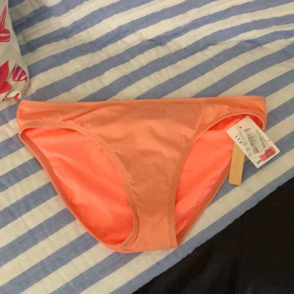 NWT coral swim bottoms.
